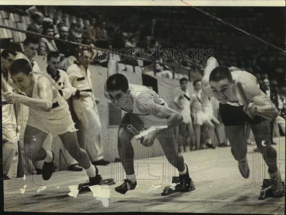 1957 Press Photo Runners on the starting blocks at Milwaukee Journal Track Meet.- Historic Images