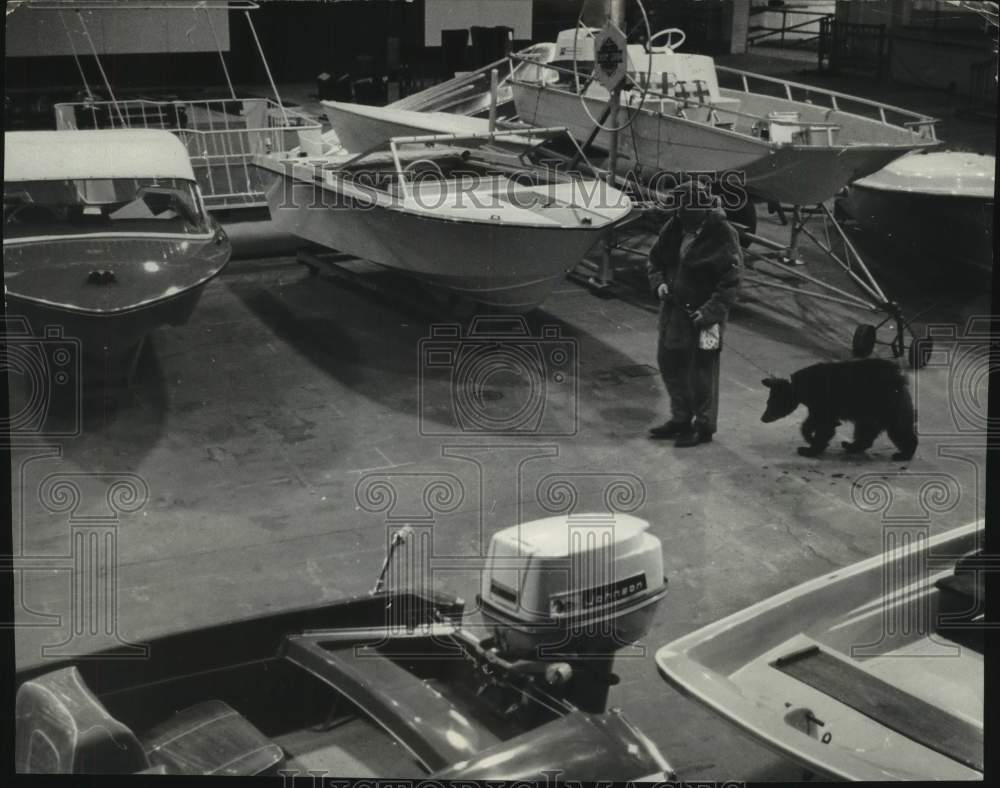 1966, Dave Irwin and his bear at The Milwaukee Sentinel Sports Show - Historic Images