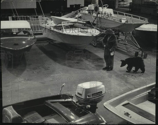 1966, Dave Irwin and his bear at The Milwaukee Sentinel Sports Show - Historic Images