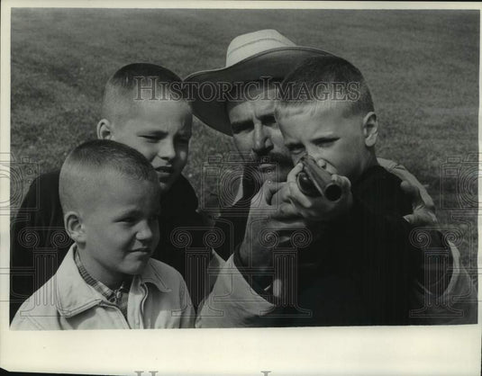 1964, Instructor Gerald Jeffery & son Stuart at Waukesha Gun club. - Historic Images