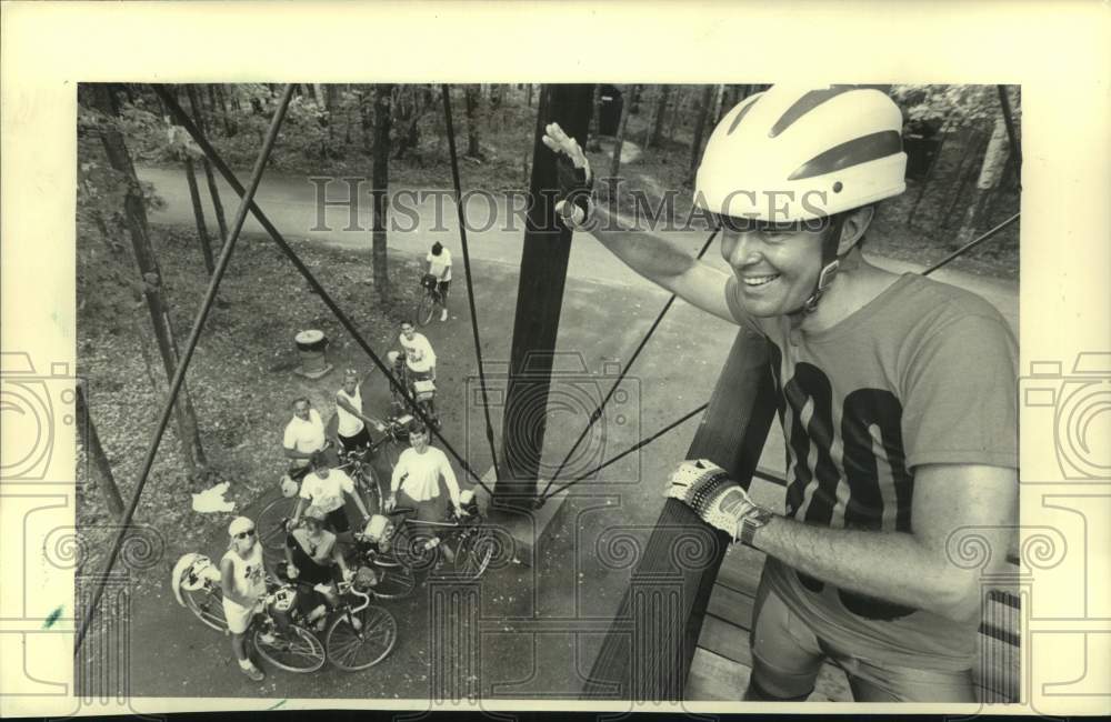 1987 Press Photo Christopher Kuban waves at Potawatomi State Park during break - Historic Images