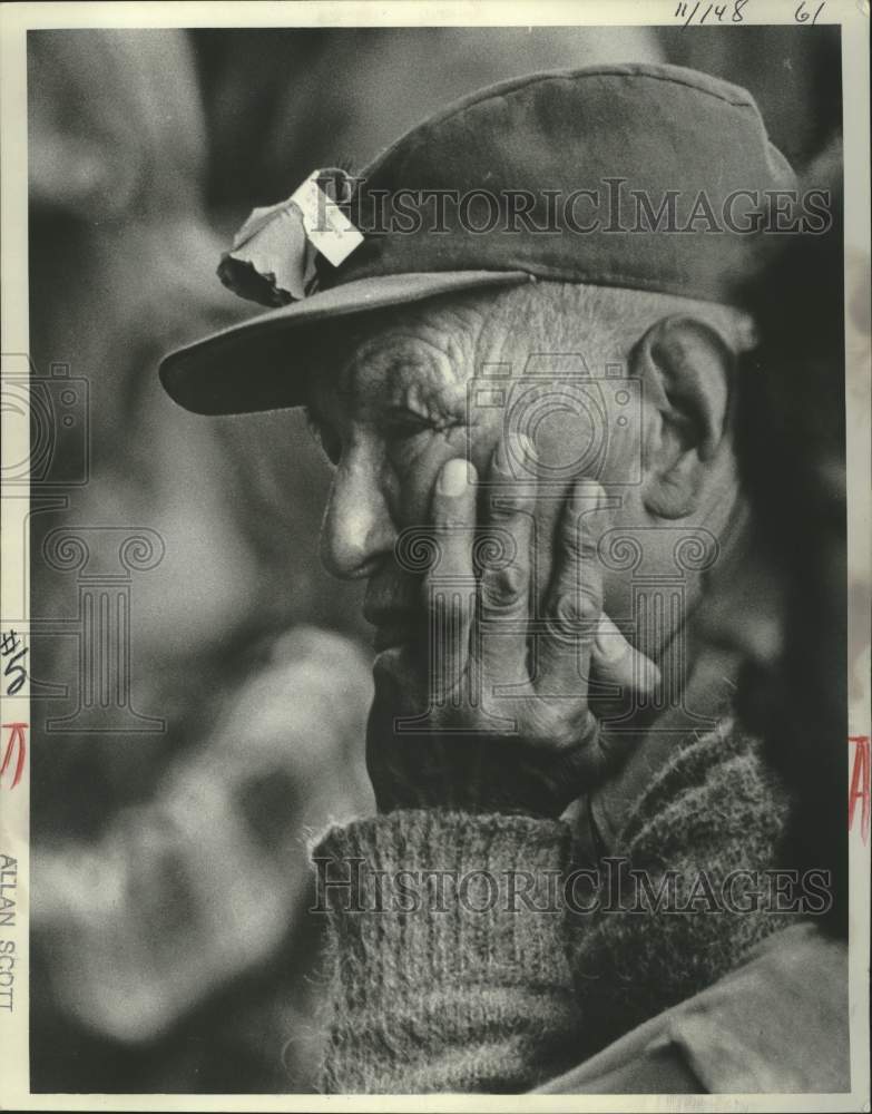 1974, Elderly Indian man listens with head in hand at AIM conference - Historic Images