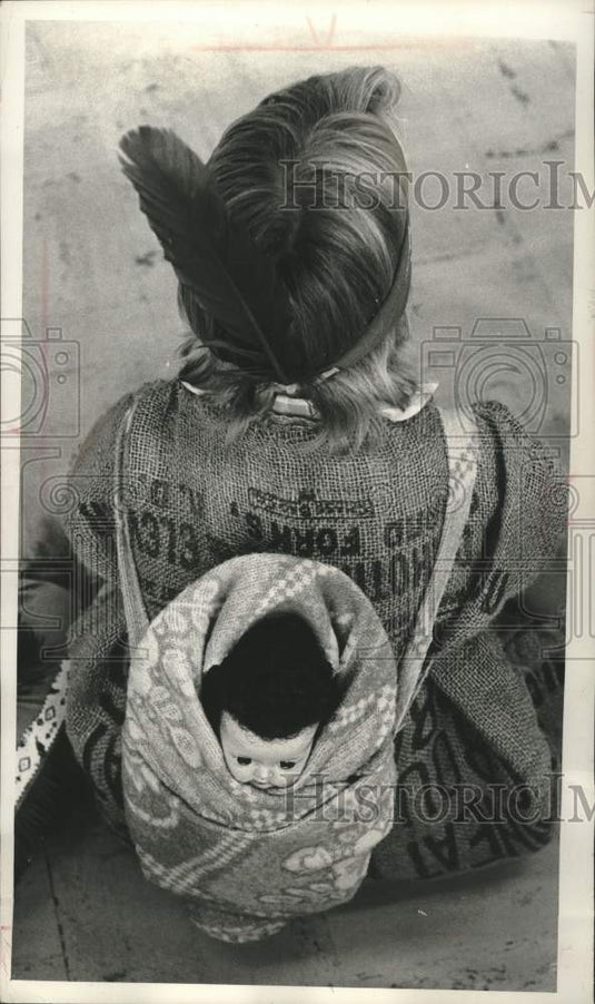 1964, Indian Hill School's Therese Nell with her papoose on her back - Historic Images
