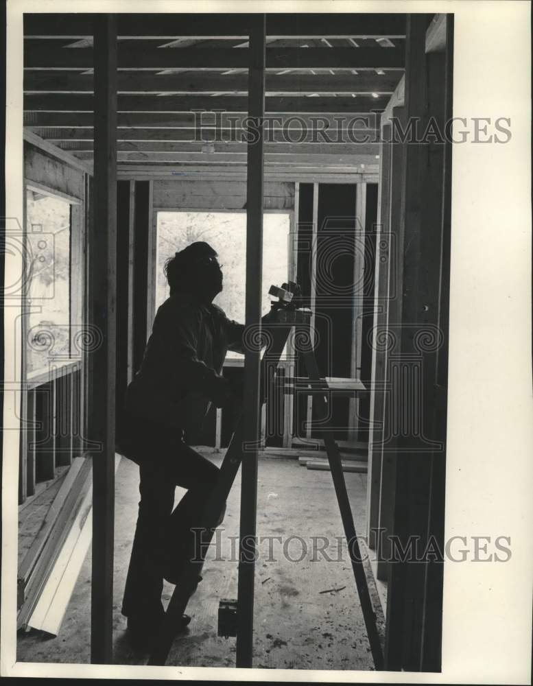1973, Electrician Leonard Quagon works on Chippewa reservation homes - Historic Images