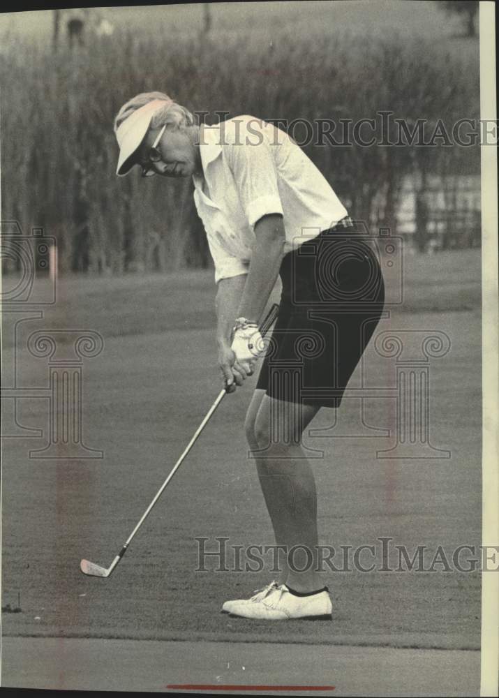 1966 Golfer Mickey Wright chips on the the 16th green Sunday. - Historic Images