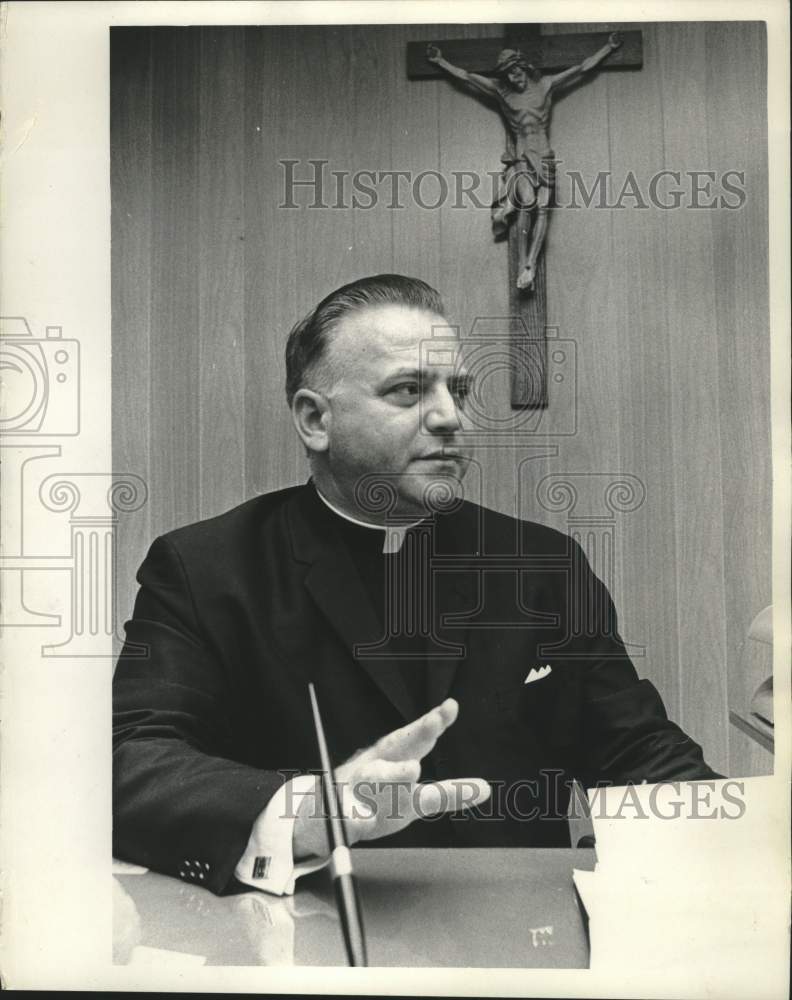 1966, Father Gabriel Stapleton President of Mt. St. Paul College WI. - Historic Images