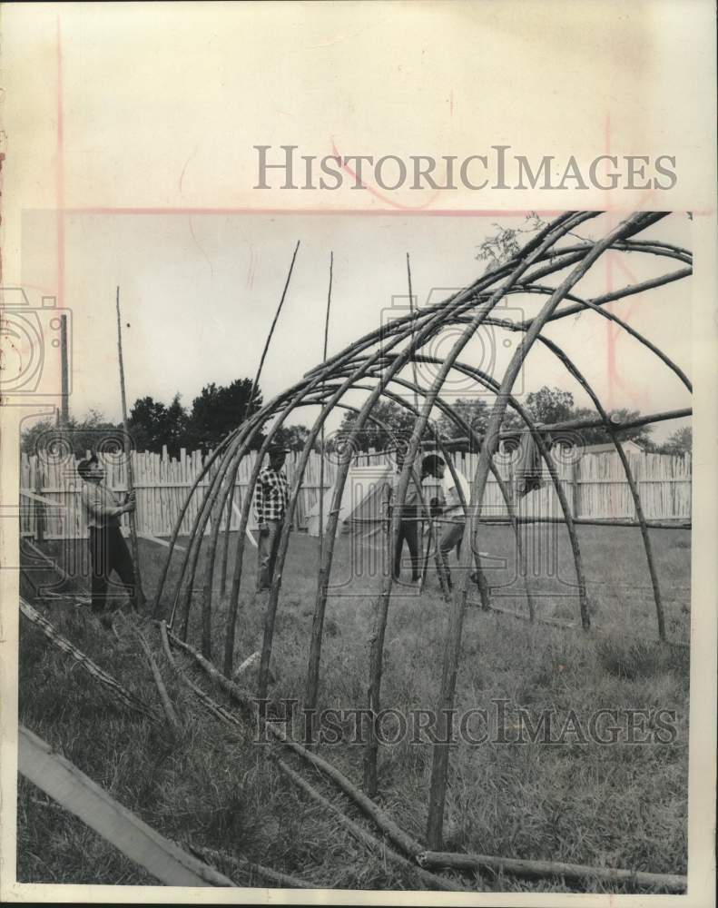1965, Menominee Indians build medicine lodge frame, Rhinelander, WI - Historic Images