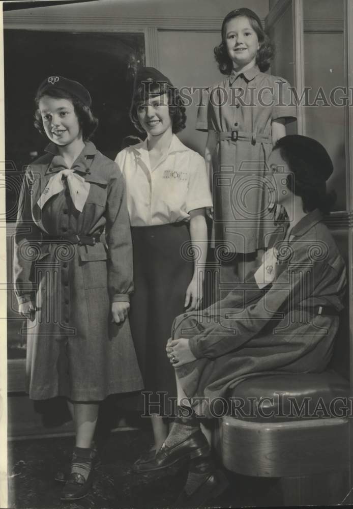 1952, Several Girl Scouts Model Different Uniforms at Boston Store - Historic Images