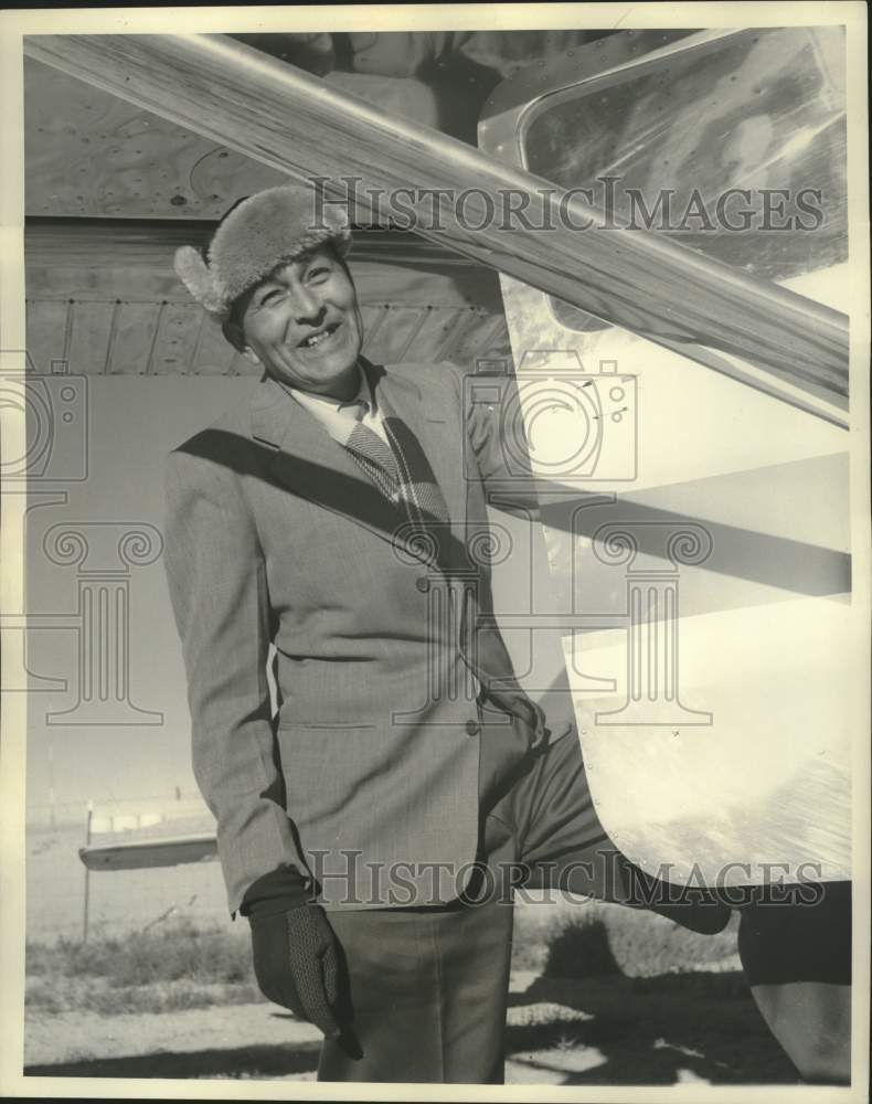 1959, Tribal elder Arthur Hubbard boards a Cessna to a powwow - Historic Images
