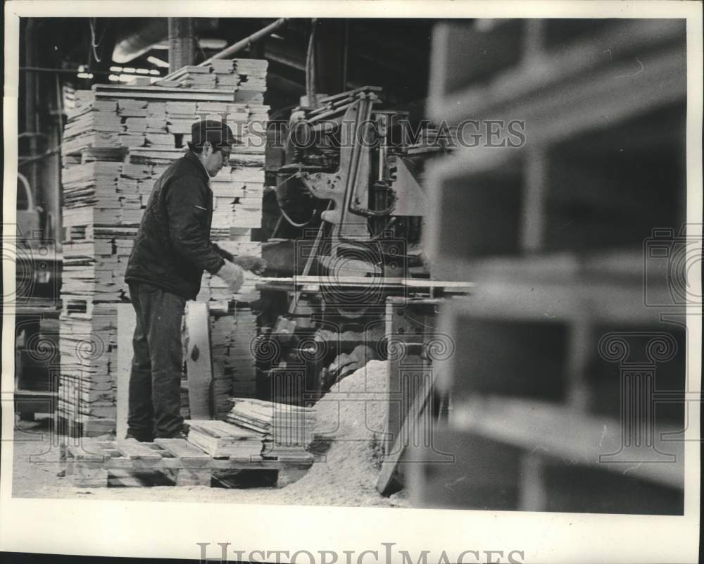 A Chippewa Indian working at Walter Brothers Pallett Plant, Reserve. - Historic Images