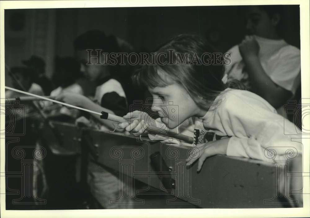 1994 Press Photo Child fishing at Milwaukee Sentinel Sports Show - mjc38684 - Historic Images