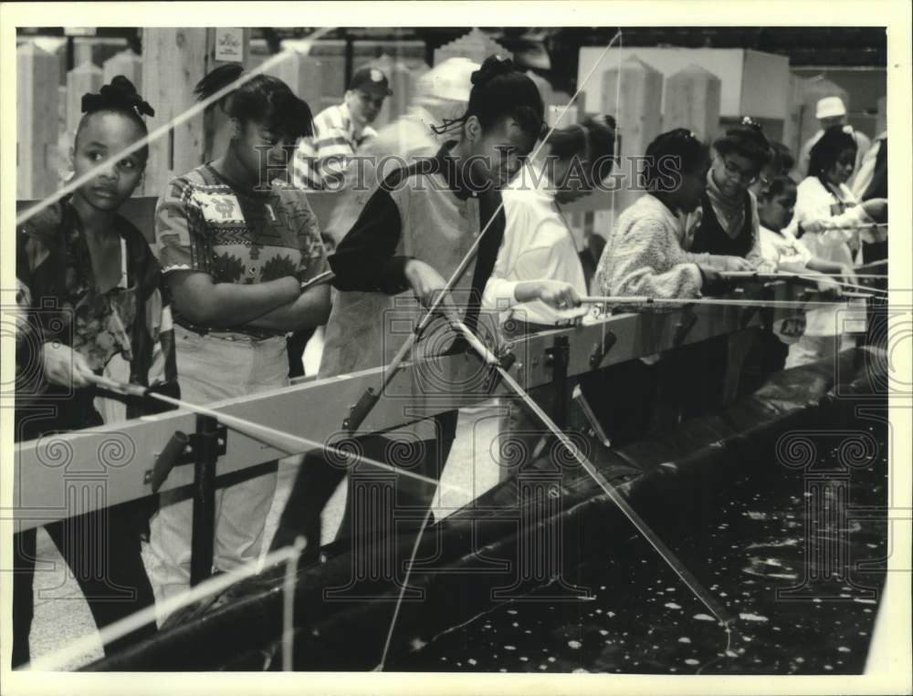 1994 Press Photo Children fish at Milwaukee Sentinel Sports Show - mjc38686 - Historic Images