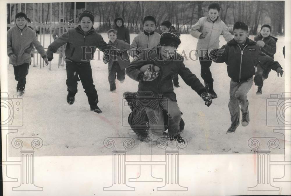 1963 Press Photo Menominee Indian kids play football, Keshena public schools, WI- Historic Images