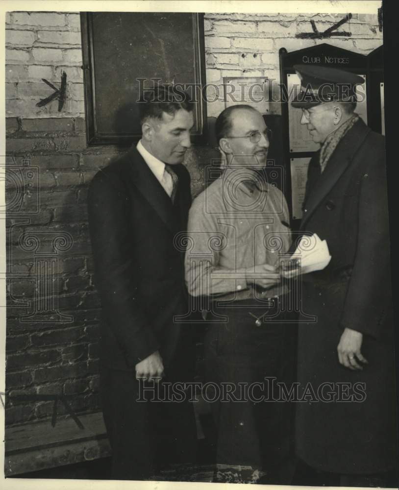 1937, United Automobile Workers of America receive flood relief check - Historic Images