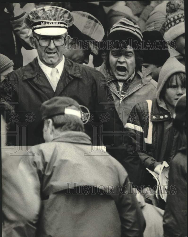 1961 Fan yells at Green Bay Packers coach, Bart Starr, leaving field - Historic Images