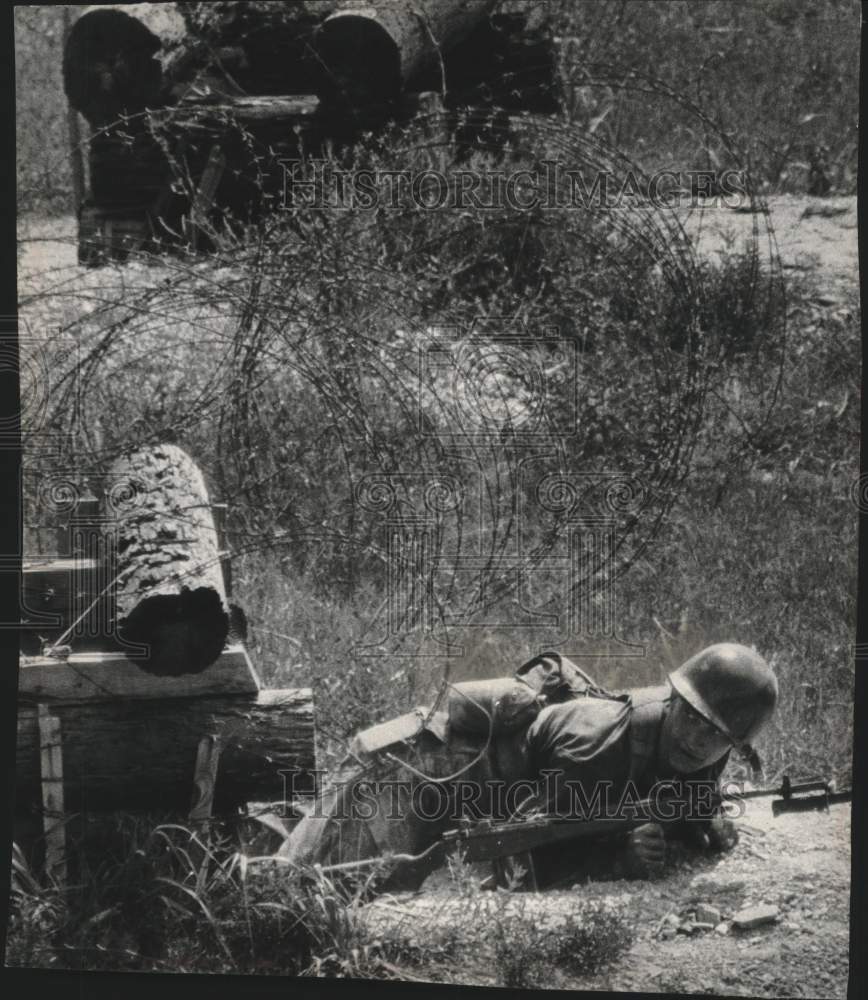 1964, U.S. Army Reserves trainee crawled from a foxhole - mjc39006 - Historic Images