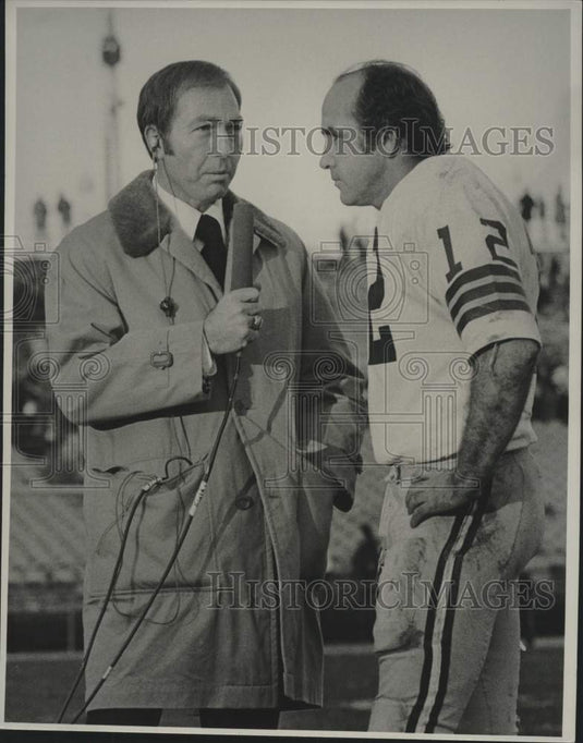 CBS Commentator Bart Starr interviews football player, John Hall - Historic Images