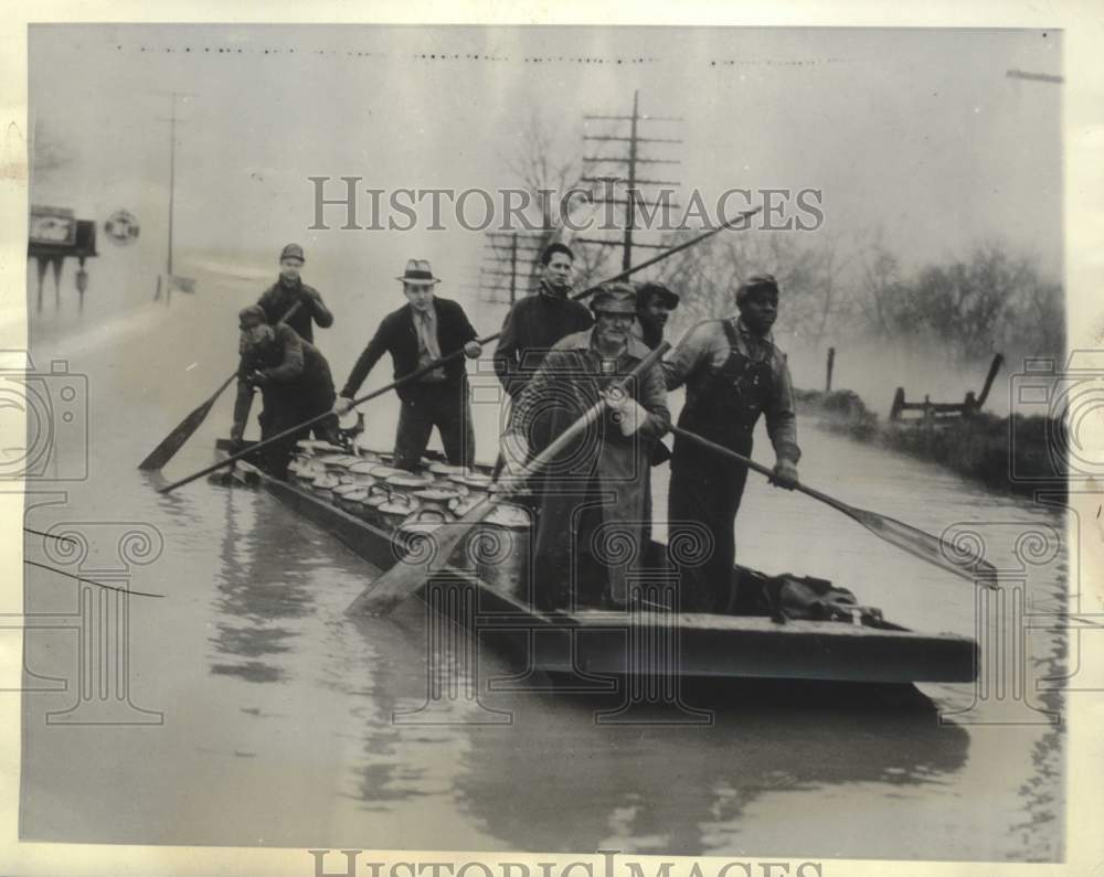 1937 Press Photo Dairymen use boats when highways are flooded in Tennessee - Historic Images