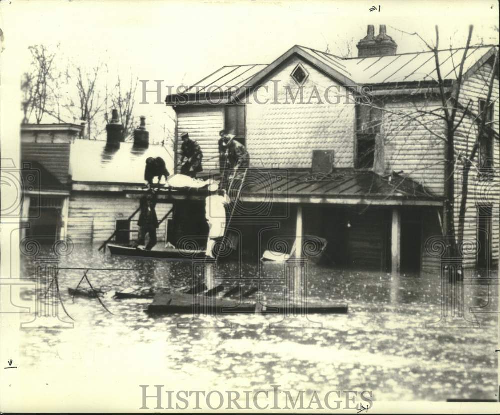 1937, flu victim Mattie Gerken removed from flooded Cincinnati home - Historic Images