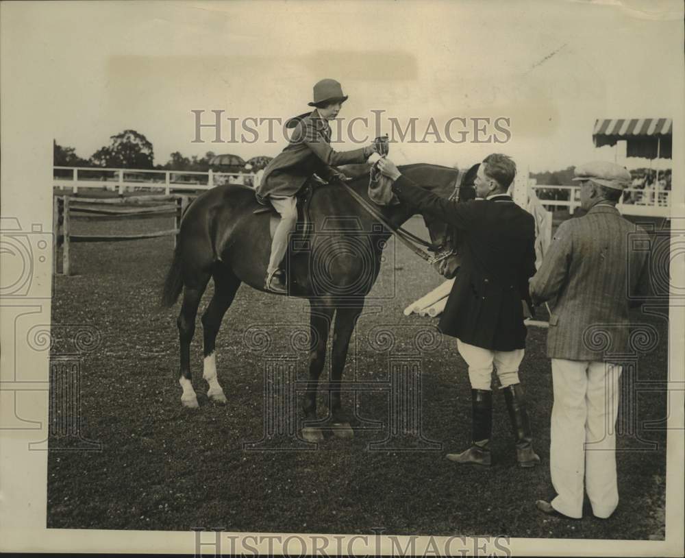 1930 Ann McIntosh riding her show horse. - Historic Images