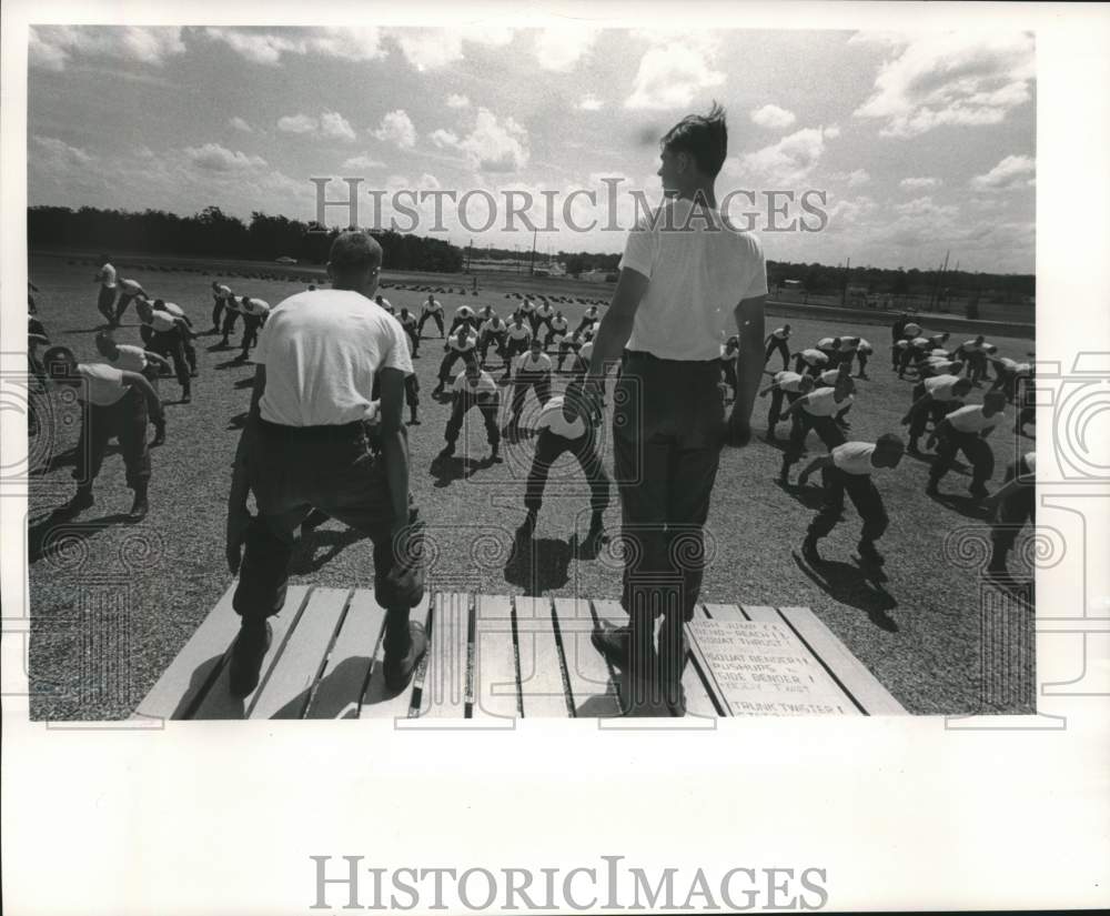 1963, Army Reserve soldiers at summer camp exercising, United States. - Historic Images