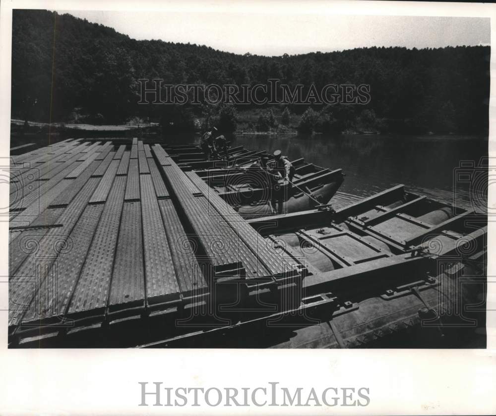 1972, Army reserves work on pontoon bridge on Big Piney river, U.S. - Historic Images