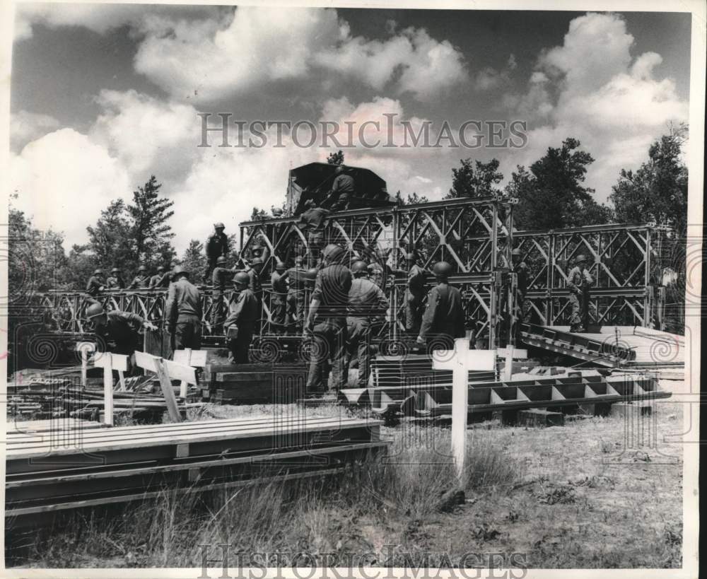 1965, Army reserves tearing down bridge to rebuild it , Wisconsin. - Historic Images