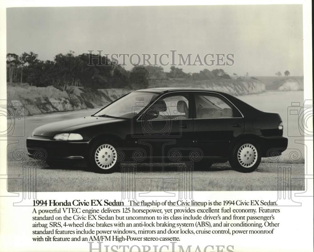 1994 Press Photo Honda Civic EX Sedan parked on the beach - mjc40059 - Historic Images