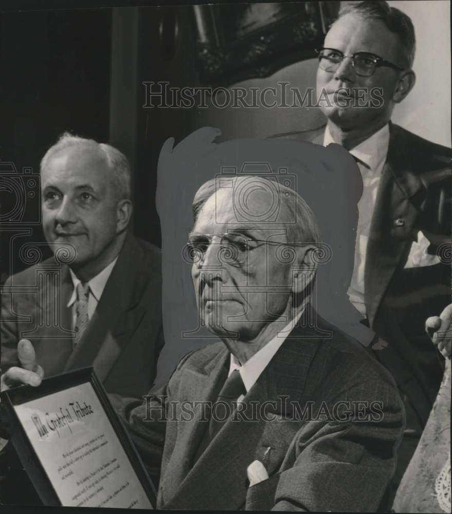 1953 Dr. Gustav Schmitt receives plaque and letter of commendation - Historic Images