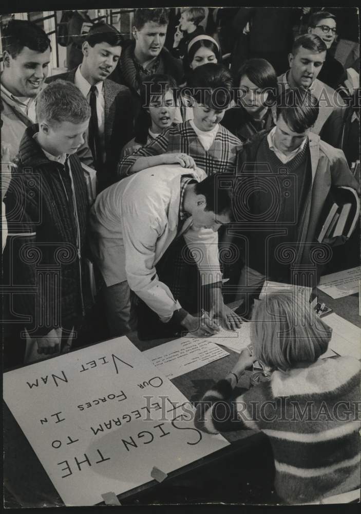 1965, Marquette University students &amp; telegram to soldiers in Vietnam - Historic Images