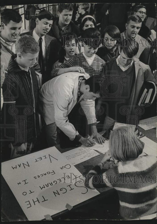 1965, Marquette University students & telegram to soldiers in Vietnam - Historic Images
