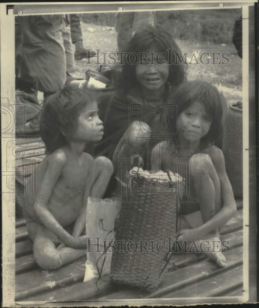 1968, Malnourished woman & her children in Saigon, South Vietnam - Historic Images
