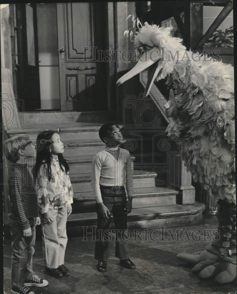 1971, Big Bird greets three young residents of &quot;Sesame Street&quot; - Historic Images