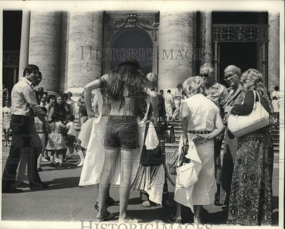 1971, Tourists cover up to enter St. Peter&#39;s cathedral in Rome - Historic Images