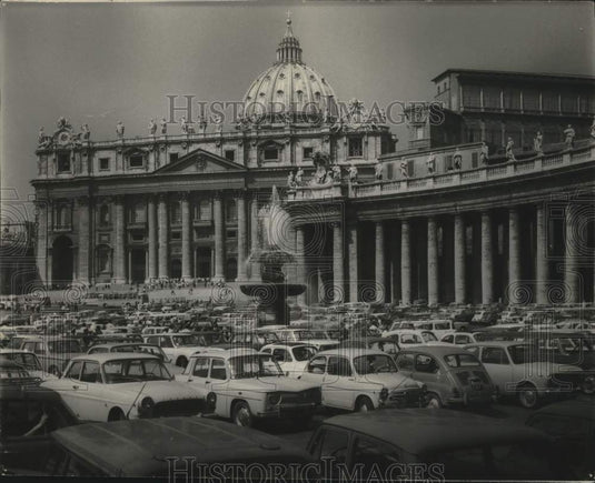 1967 Sea of cars parked at St Peter's Basilica during tourist season - Historic Images