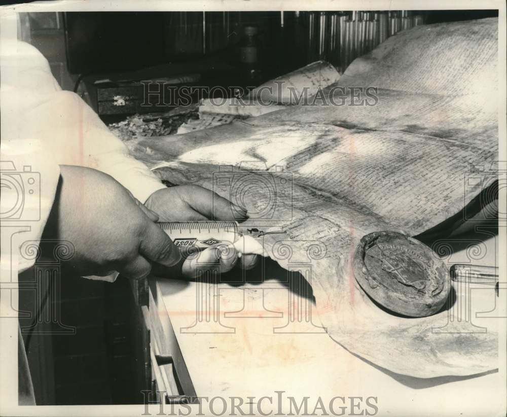 1963, Benedictine monk injects old book with vitamins, Vatican City - Historic Images