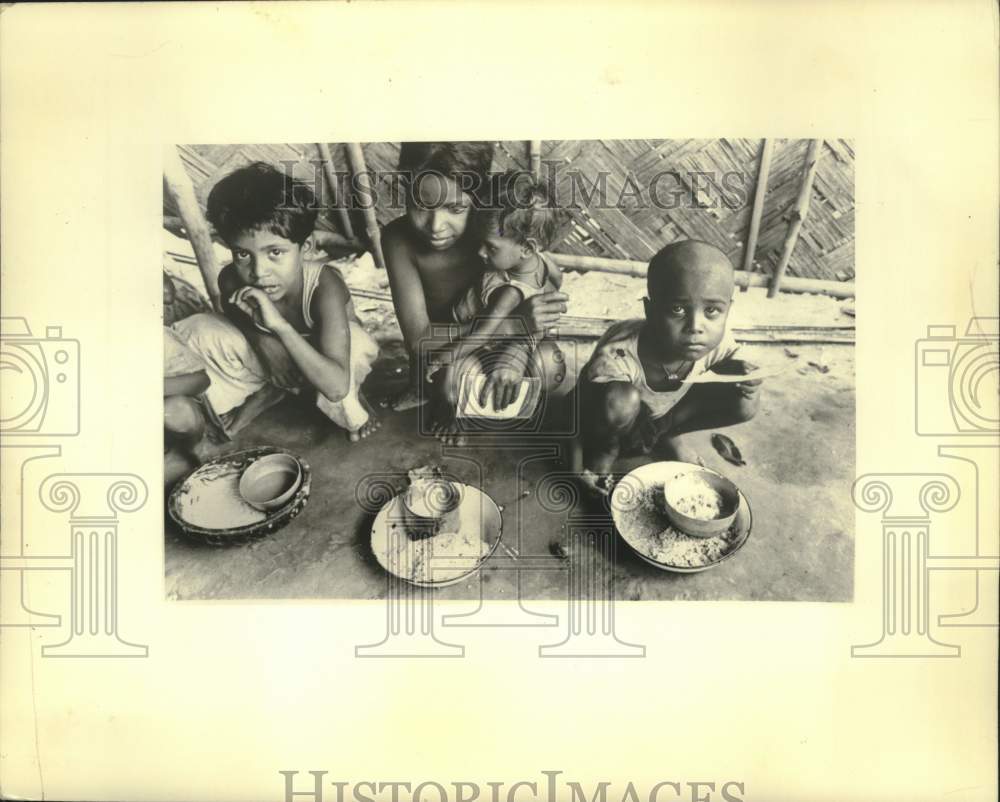 1973, Hungry children from India with little to eat due to cost. - Historic Images