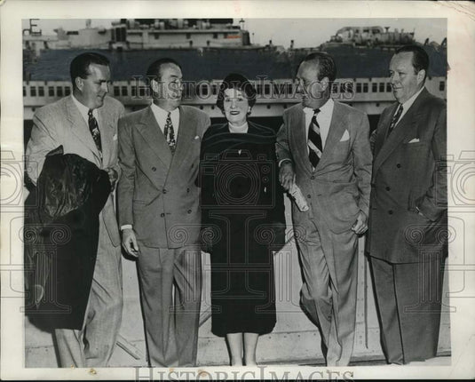 1952, Mrs. W. R. Hearst's Sons Welcome Her Return on Queen Elizabeth - Historic Images
