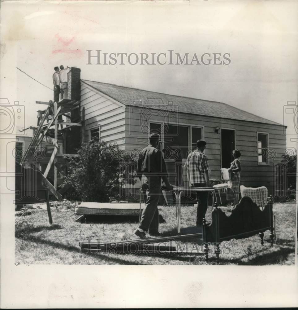 1953, Furniture Moved Into Home Rebuilt After Tornado in Michigan - Historic Images