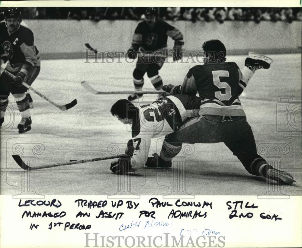 1983 Press Photo Milwaukee Admiral Daniel Lecours Tripped by Flint&#39;s Paul Conway - Historic Images