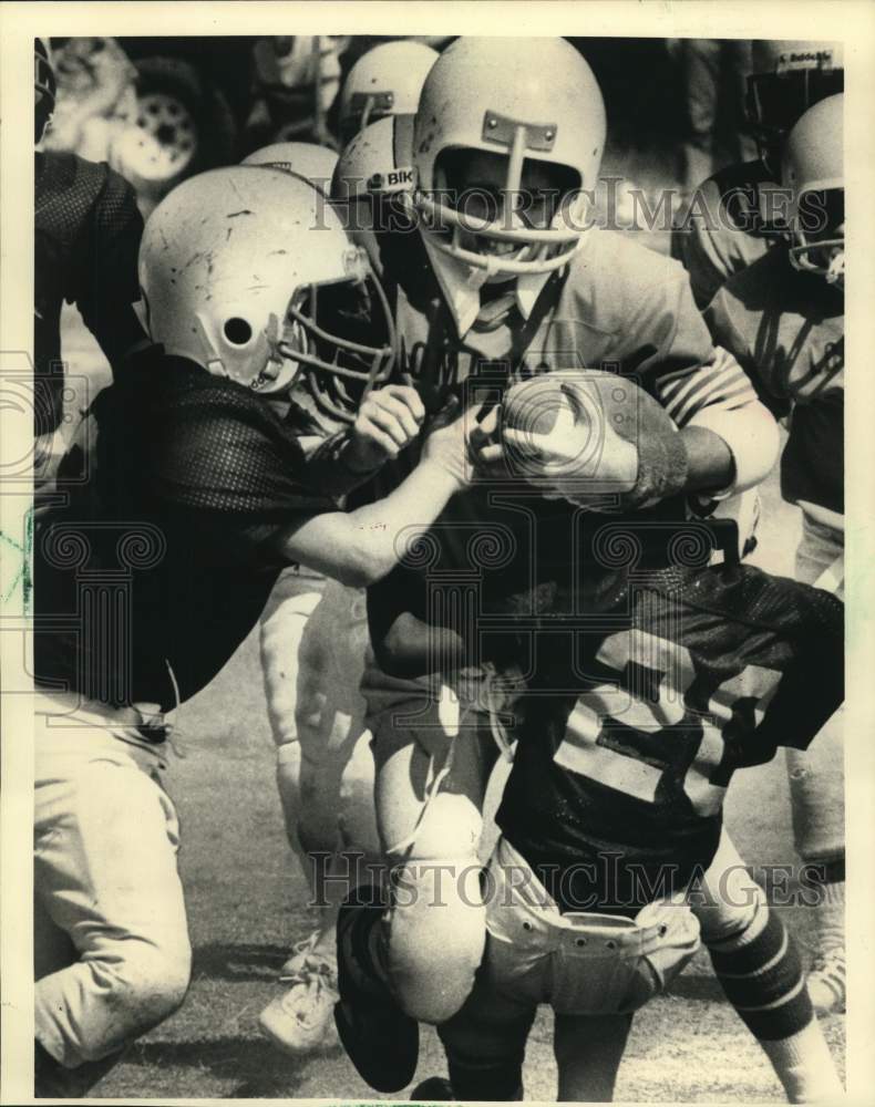 1985 Press Photo Kids Football Can Be Rough as Ball Carrier is Tackled - Historic Images