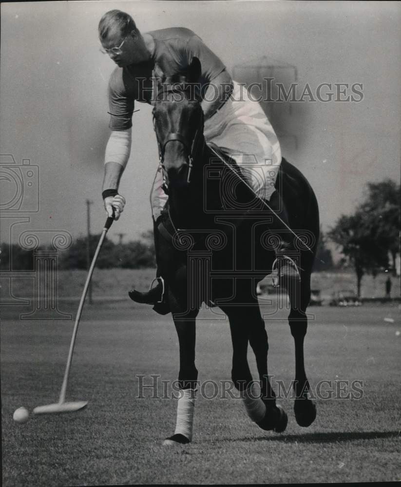 1957 Press Photo Robert A. Uihlein, Jr. Drives Ball During Polo Match- Historic Images