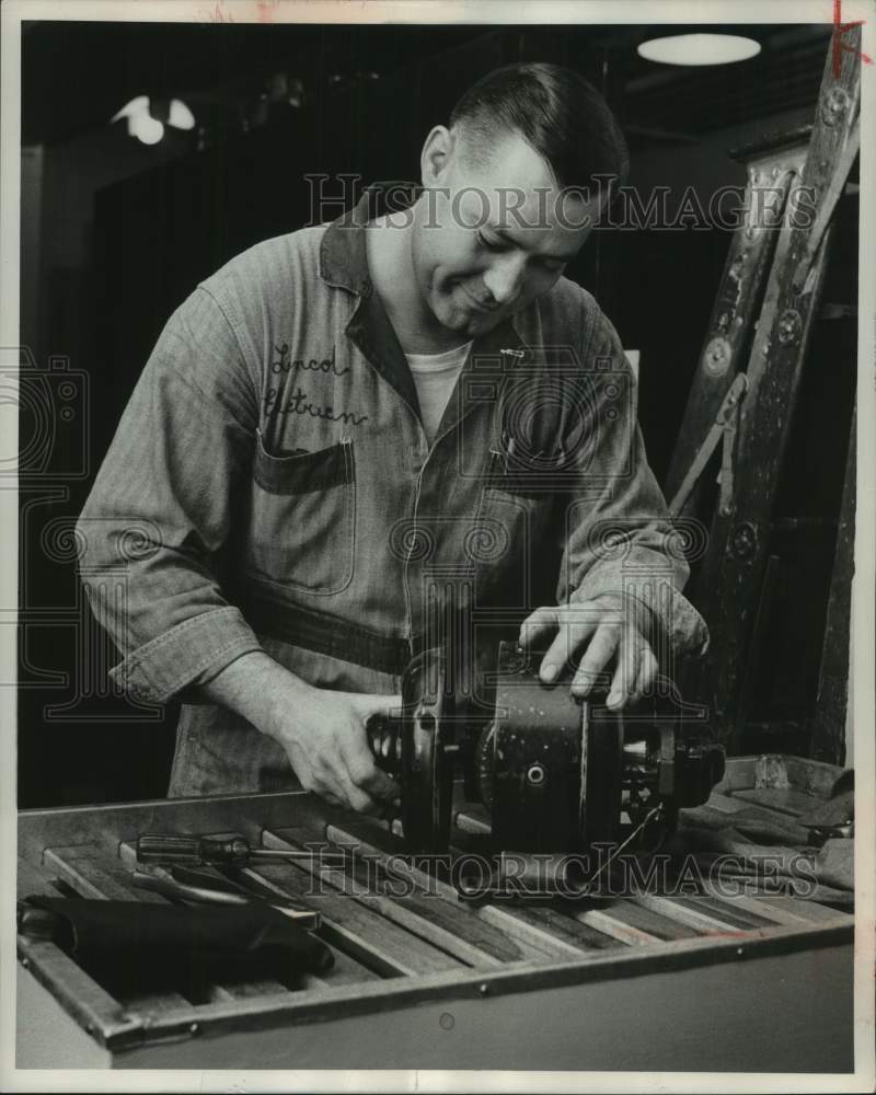 1956 Press Photo Lincoln Freuck, Milwaukee Journal Maintenance Man - mje00186- Historic Images