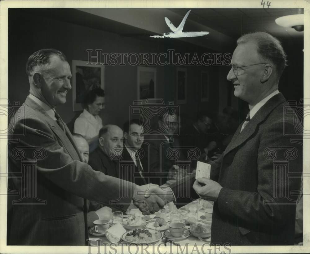 1951 Milwaukee Journal Employees shake hands at First Aid Class, WI - Historic Images