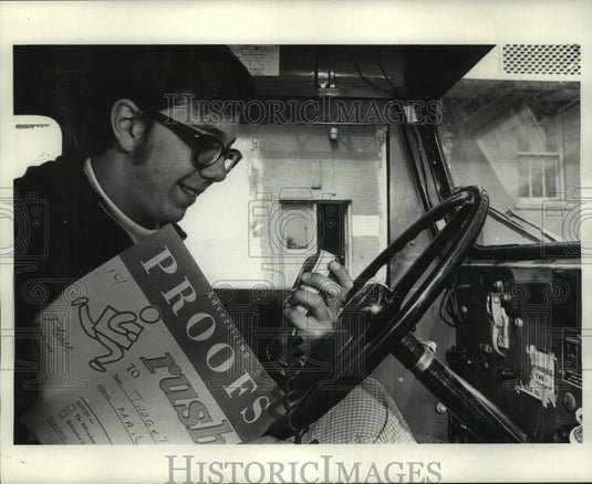 1971, Employee on radio for Milwaukee Journal Advertising Services - Historic Images