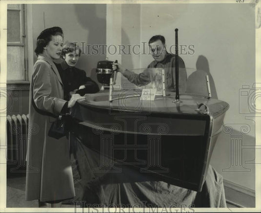 1951 People look at a boat at the Milwaukee Journal's Hobby Show, WI-Historic Images