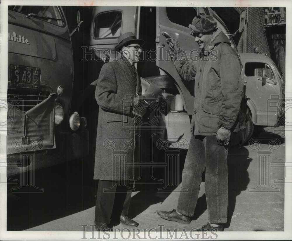 1955, Milwaukee Journal employee Bob James handling accident claim WI - Historic Images