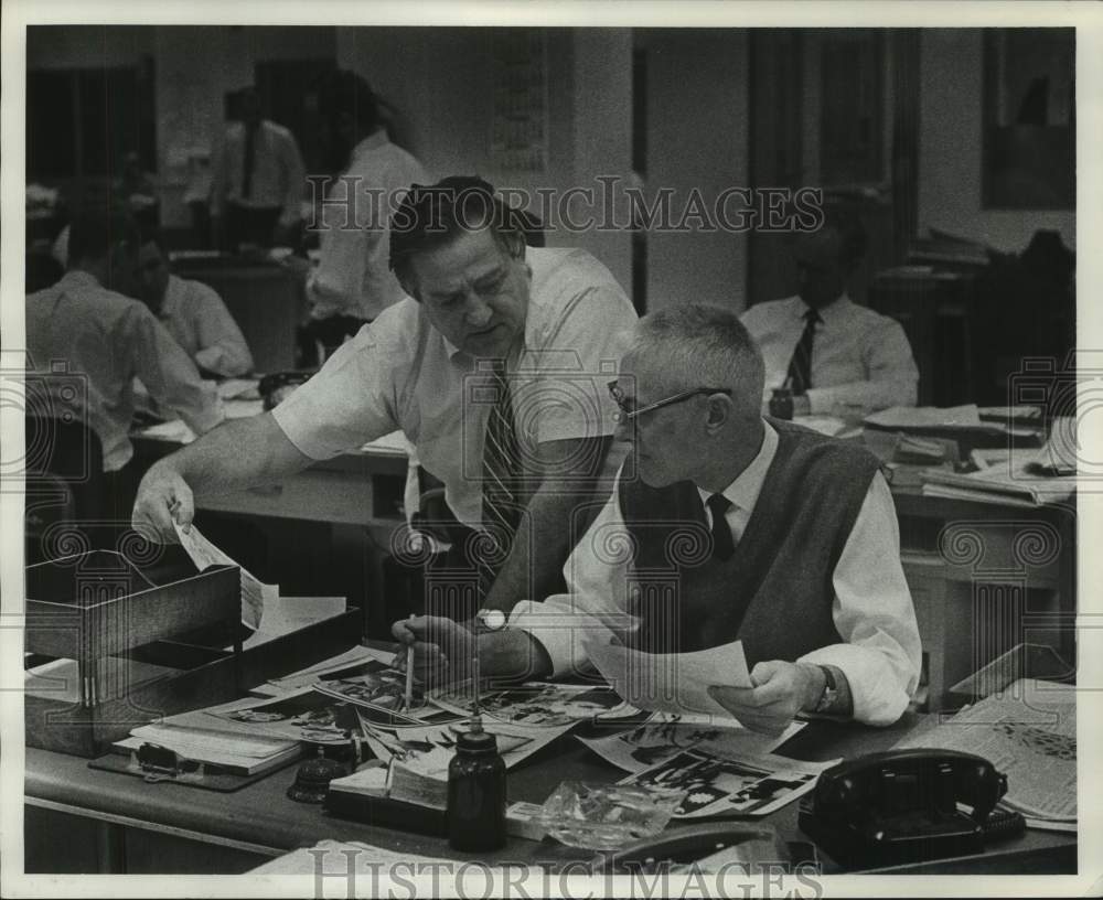 1967, Men work on the layout of last issue of the newspaper Peach, WI - Historic Images