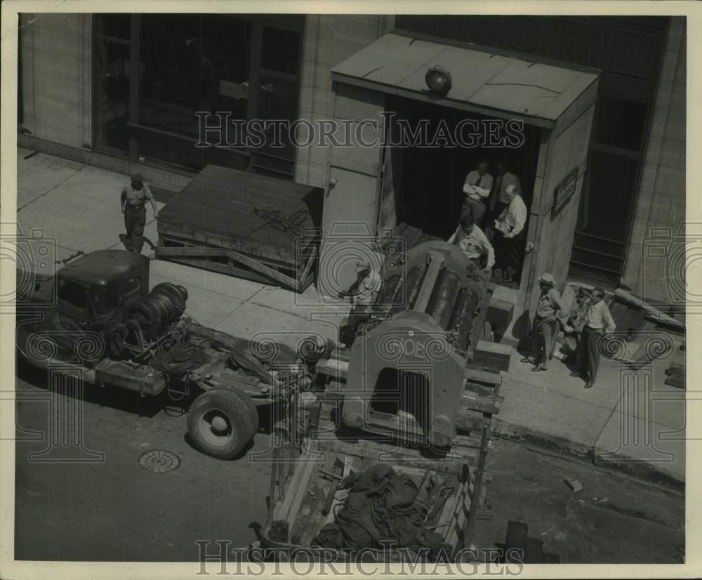 1947, Men deliver a print press to Milwaukee Journal Newspaper, WI - Historic Images