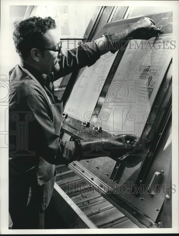 1975, Milwaukee Journal Worker inspects Newspaper, Composing Room, WI - Historic Images